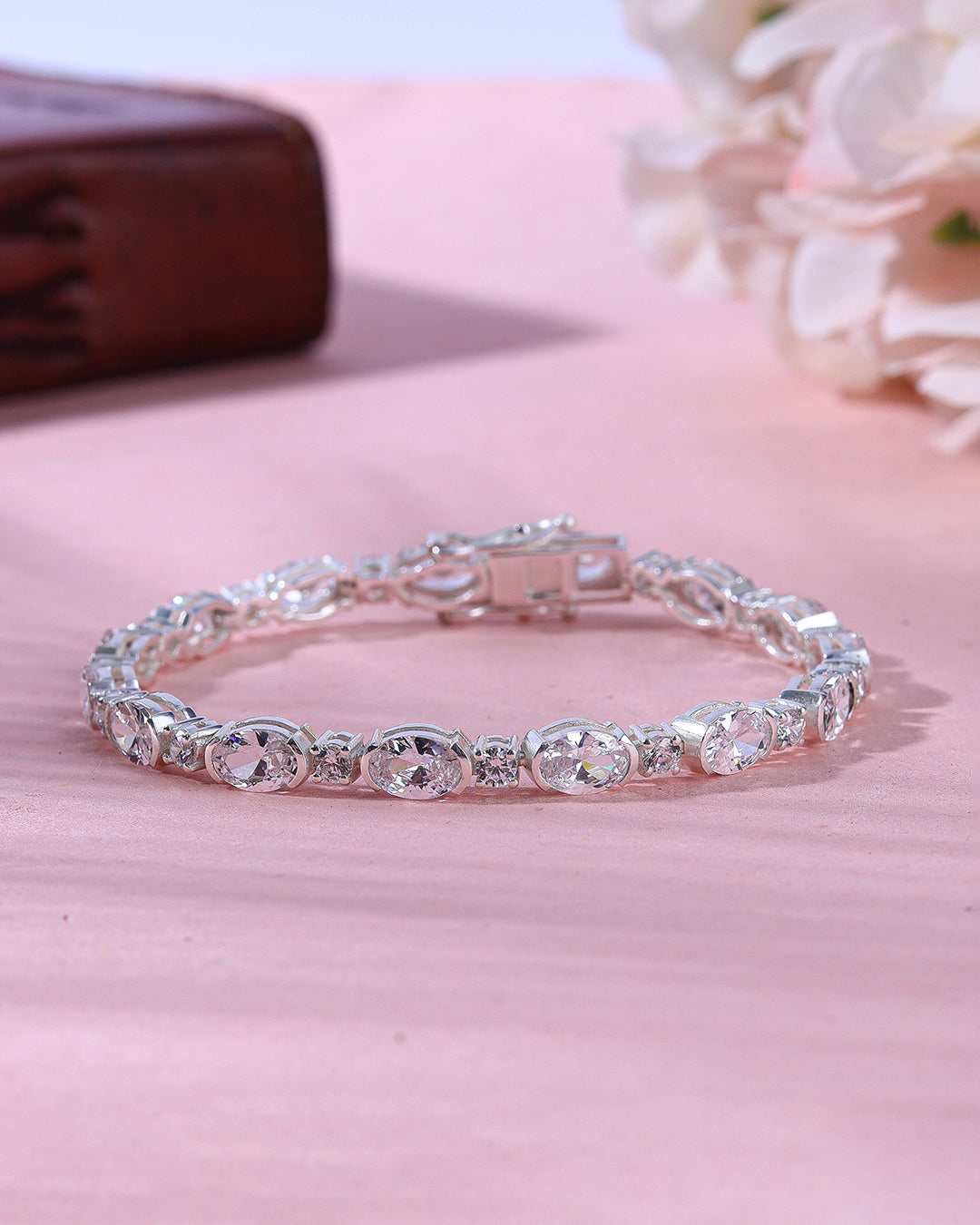 Bezel Set Oval Zirconia Bracelet with Accents